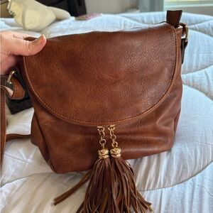 Elegant Brown Leather Crossbody Bag with Tassels